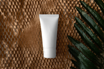 Mockup facial skincare white tube bottle natural product on Honeycomb Environmental friendly...