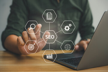 Closeup businessman working remotely at office, SEO search engine optimization concept diagram with...