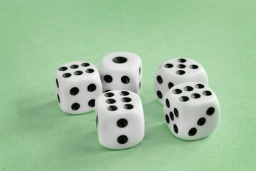 Dice on green background