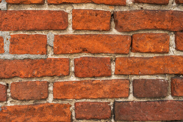 A close up picture of old red brick