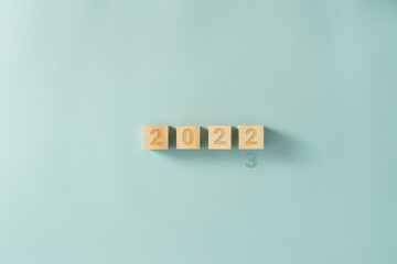 2022, 2023 sign on wooden cubes