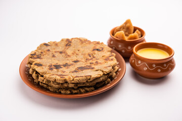 Sweet roti made out of rice flour, jaggery, and ghee. Gud ki roti. gur ki roti, jaggery Bhakri, meethi gud ki roti. Winter food. Copy space.