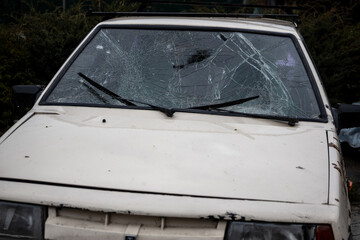 Obraz premium Irpin, Kyev region Ukraine - 09.04.2022: Shot cars. On the streets of Irpin. Cities of Ukraine after the Russian occupation. Irpin, Bucha, Hostomel.