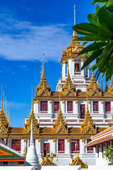 Naklejka premium Wat Ratchanaddaram Worawihan It is a unique temple in art. It is a beautiful and famous old tourist attraction. Located in Bangkok, Thailand