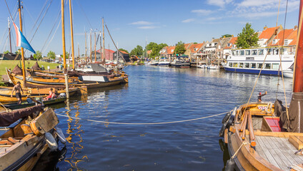 Traditional wooden boats in the harbor of Elburg, Netherlands
