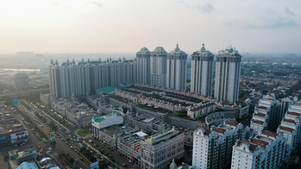 Aerial view of new green urban landscape in the city. Cityscape of a residential area with modern...