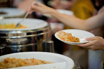 scooping the food, catering, dinner time
