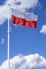 Fototapeta na wymiar flag of Poland flying in the wind