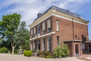 Fototapeta na wymiar Historic house and garden in the center of Haastrecht, Netherlands