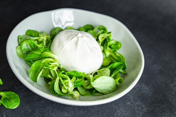 buratta salad green leaves mix fresh healthy meal food snack diet on the table copy space food background rustic top view