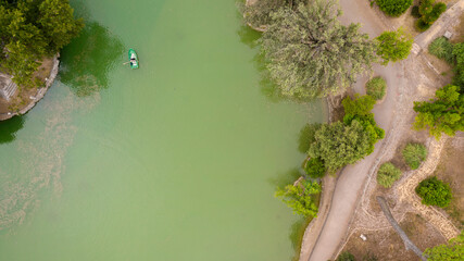 Aerial view of the small lake in Villa Borghese park. This pond is located in Rome, Italy. There is...