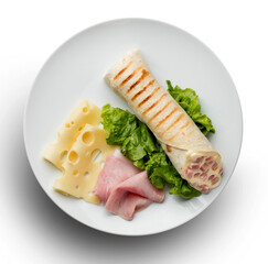 Plato con jamón, queso ensalada  y burritos. Plate with ham, cheese salad and burritos.