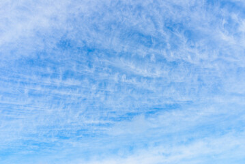 Summer blue sky white clouds light white background. Beauty clear cloudy in summer day bacground.landscape in environment day horizon skyline view spring windy day.