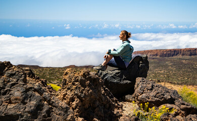 Obraz premium woman hiking in El Teide national park Tenerife