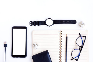 Smartphone,Smartwatch,Black Wallet,Black Pencil,USB cable,Eyeglasses and Notebook on White...
