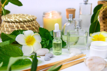 Obraz na płótnie Canvas Background spa cosmetics and oils and herbs. Selective focus.