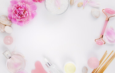 Pink flowers on white background spa facial. Selective focus.