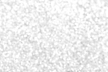 White and gray bokeh background. Photo can be used for the concepts of New Year, Christmas, Wedding Anniversary and all celebrations.