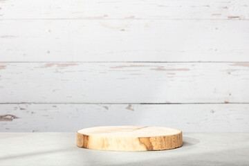 Wood podium of cylinder shape on natural background for product.  Minimal concept