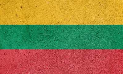 National flag of Lithuania on a plastered wall