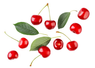 Naklejka na ściany i meble Cherries with leaves are flying on a white background. Isolated