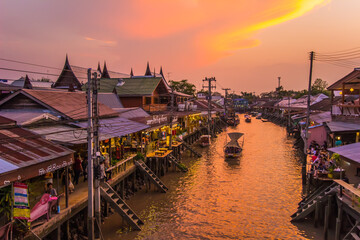 Amphawa district,Samut Songkhram Province,Thailand on April 12,2019:Amphawa Floating Market with beautiful sunset sky