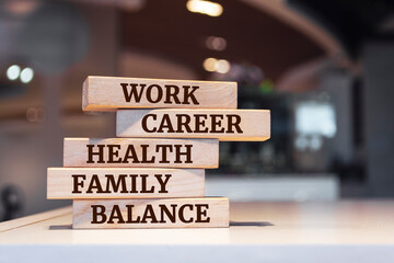 Wooden blocks with words 'work, career, health, family, balance'. work balance