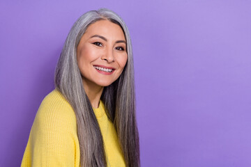 Photo of mature stunning lady with long hair visit hairdresser keratin straightening isolated on violet color background