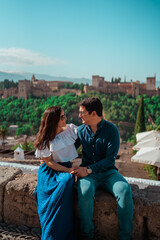 Fototapeta premium beautiful couple in love sitting with nice background