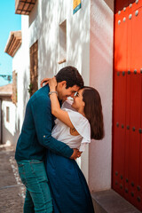 beautiful couple in love hugging and looking at each other