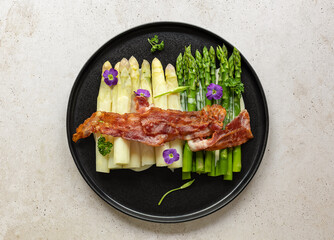 Green and white asparagus with fried bacon. Great seasonal food, easy cooking meal for keto diet dinner or lunch.