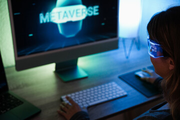 Young woman using augmented reality futuristic glasses with led light - Focus on glasses