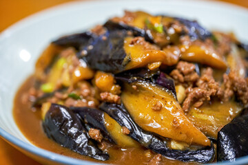 A delicious Chinese dish, fried eggplant in sauce