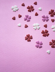 Pink and white hearts on a pink background, postcard for Valentine's Day. Place for text.