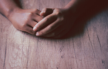 Asian woman's hand. Dark tone image, copy space.