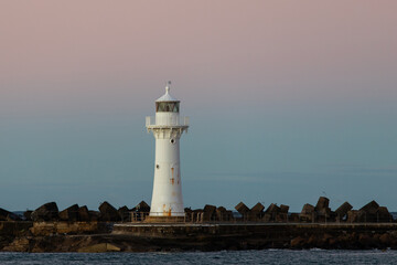 Breakwater Lighthouse at sunset time, Wollongong, Australia.