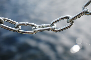 Silver metal chain, defocused background