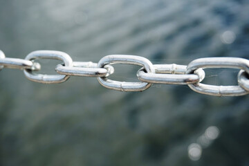 Silver metal chain, defocused background