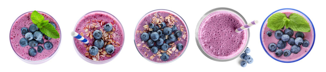 Set with delicious blueberry smoothies on white background, top view. Banner design