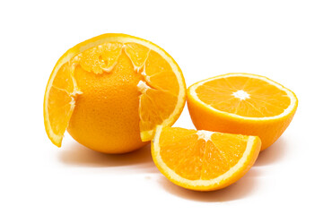 fresh whole and slices orange isolated on white background