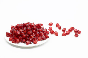 Pomegranate seeds isolated on white background With clipping path. Full depth of field