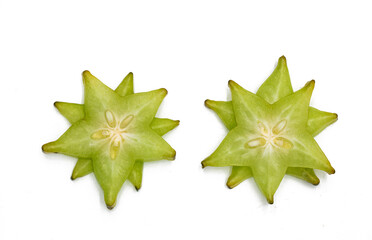 Fototapeta premium fresh carambola or Star fruit slices on white background. top view