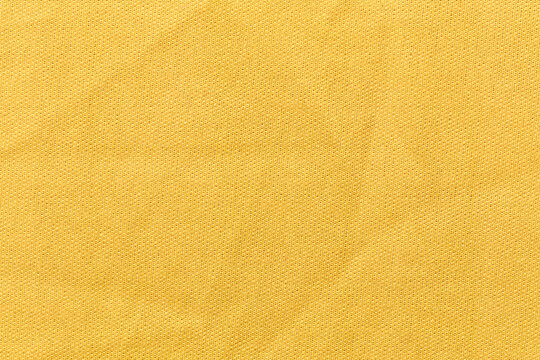 High Resolution Yellow Textile stock textured as background.