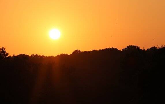 Orange Sunset In The Mountains