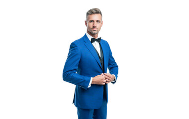 handsome formal man in blue tuxedo bowtie isolated on white background