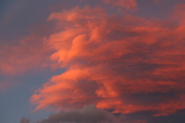 Naklejka na ściany i meble Sunset fire clouds in the sky
