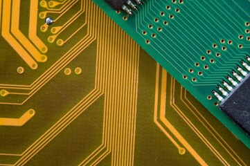 microprocessor on the background of the microcircuit of the motherboard