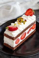 Strawberry cake. Cake with cream filling in the middle. Turkish cuisine delicacies. Traditional delicious Desserts. close up