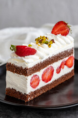 Strawberry cake. Cake with cream filling in the middle. Turkish cuisine delicacies. Traditional delicious Desserts. close up