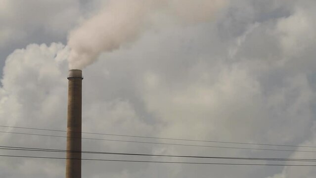 Petro chemical chimney stack pouring out pollution